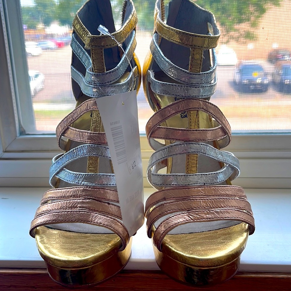 Michael Kors Small scuff from storing only tryon inside. Weight gain/my loss👠